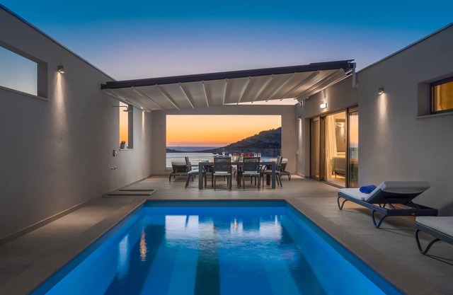 Luxury villa with heated private pool. Beach 20 m from villa, amazing view