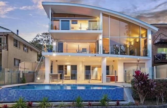 Luxury Waterfront Home with pool and spa family and pet friendly.