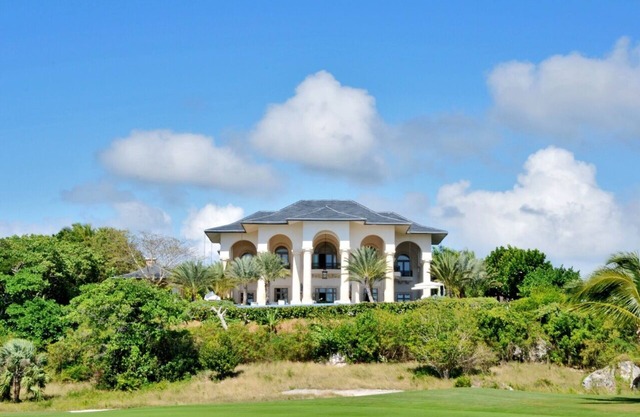 Magnificent Mansion with amazing views to the Caribbean Sea and the Golf Course!
