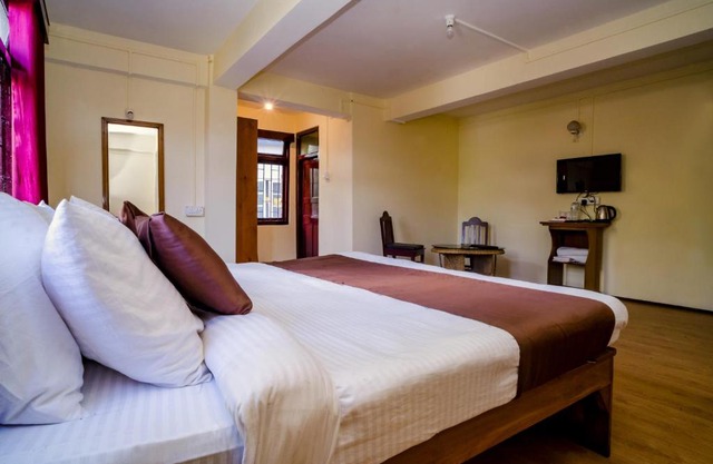 Magpie Mall Road Residency (MG Marg)