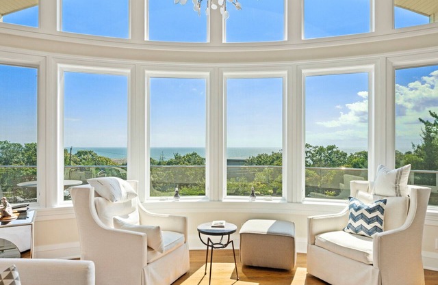 Majestic contemporary beachfront home sited on 1.32 acres with private .