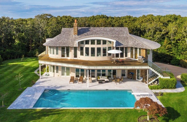 Majestic contemporary beachfront home sited on 1.32 acres with private .