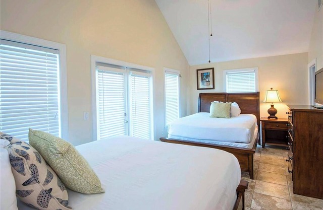 Make Yourself at Home with a Complete Kitchen and Pool Access Just Steps Away!