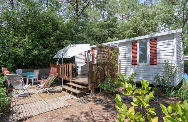 Mobile home on a family campsite with swimming pools