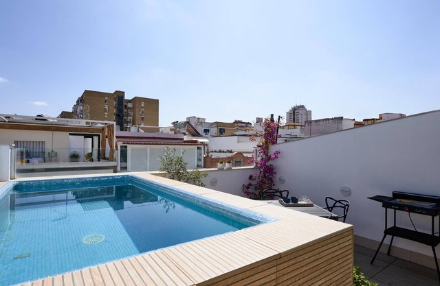 Modern and smart house with a pool and a garage