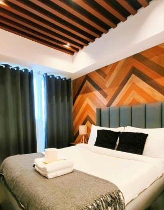 Modern Elegance Escape in Azure North Bali Tower near Malls, Airport and NLEX