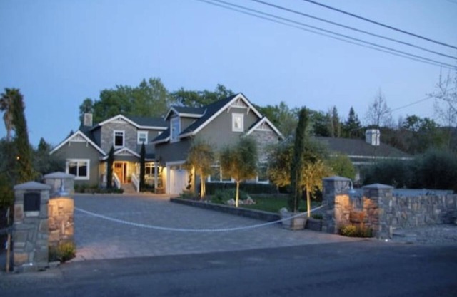 Modern farmhouse on the edge of town with pool.