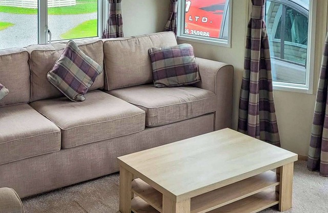 Modern holiday home with a large comfortable living area and dining area.