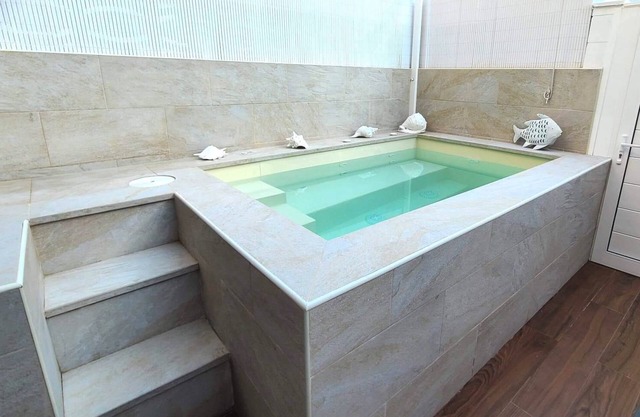 Modern house with fantastic sea views, heated Jacuzzi and WIFI