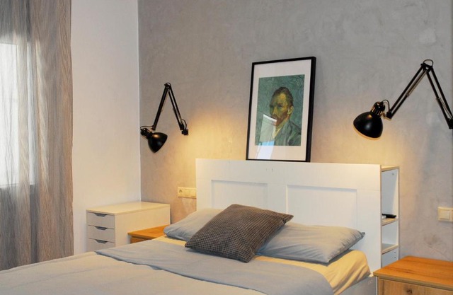 Modern house with garden and bathroom TV in front of the Venetial Walls