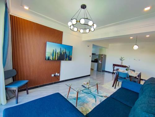 modern serenity suites apartments with swimming pool,modern equipped gym,private parking space, children playing ground, proximity to major shopping malls and unbeatable city views