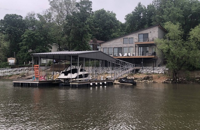 Modern waterfront home on Monkey Island with dock