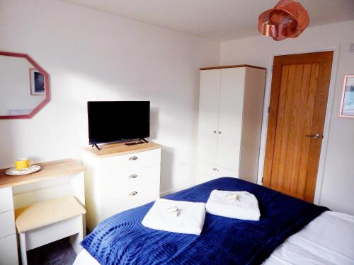 Modern, well located en-suite rooms with parking - Orbitat Accommodations