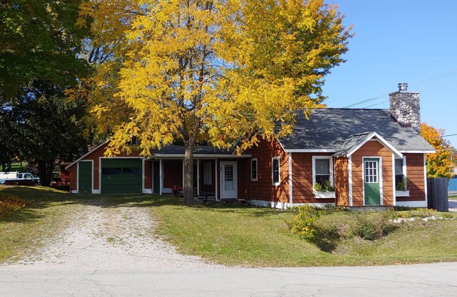 Need a getaway?nCharming Lake Leelanau village cottage