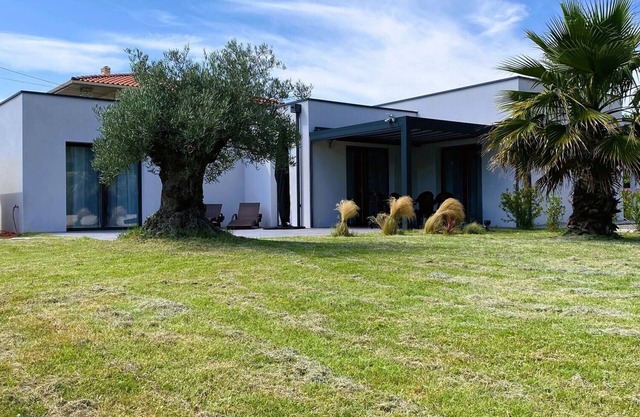 new architect villa with large terrace and patio 800 m from the sea