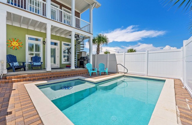 Newly remodeled! Only steps to the beach! Private Pool!