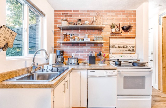 Newly-renovated, dog-friendly home w/ a private hot tub & large grassy yard