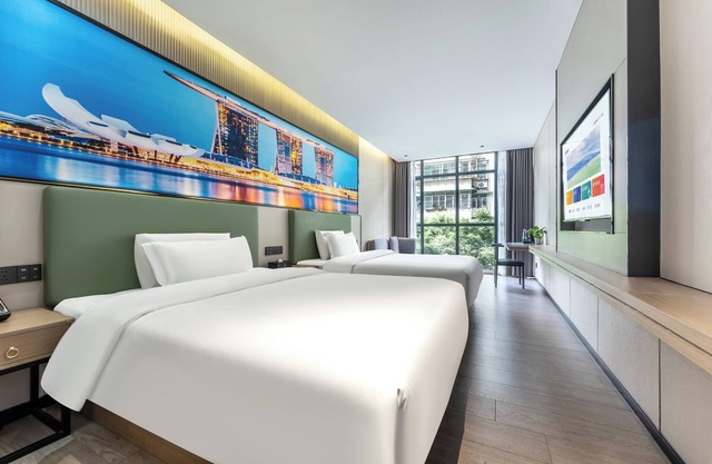Norman Hotel - Free shuttle service during the Canton Fair in October and November