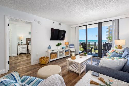 Ocean View Balcony just STEPS to the Beach with Pool, Parking and Wi-Fi!
