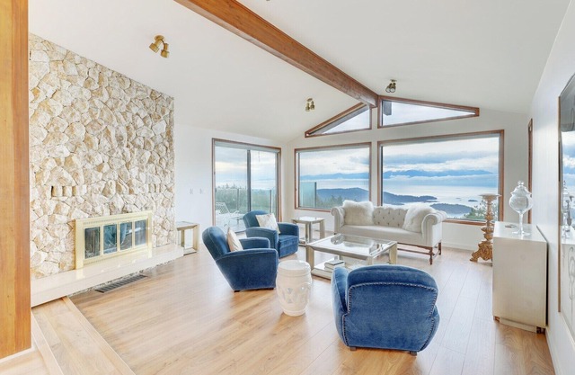 Ocean-view estate surrounded by trees, perched atop Mount Matheson. Sleeps 12!