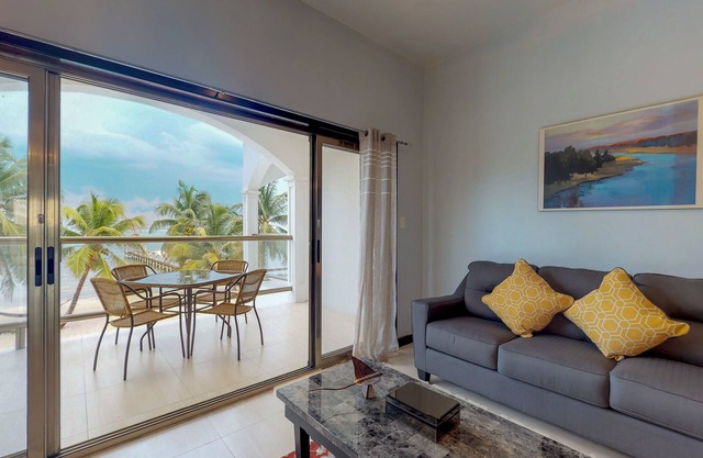 Oceanfront condo with amazing water views, partial AC, WiFi & pool