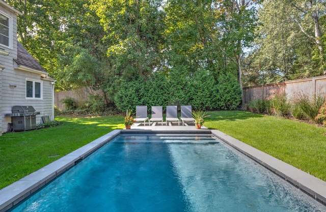On Prestigious Redwood Island, Overlooking Waterfront Sunsets and Marinas
