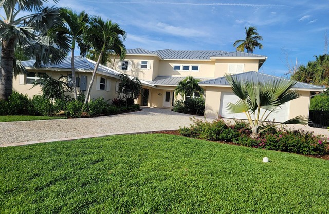 On the gulf is a luxury beach front home with unforgettable sunset views.