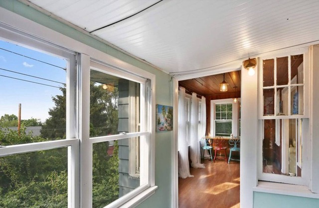 Outdoor living steps from the beach with great lake views! Great location