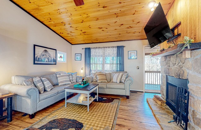 Outdoor retreat near the river with a firepit & grill - pool, game room, and gym