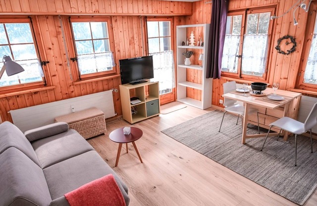 Outside: Ground floor flat for 2 persons, private garden with garden furniture and nice view, shuttl