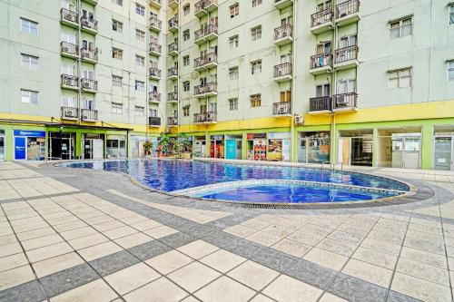 OYO 93426 Metro Suites Apartment By Goodvibes
