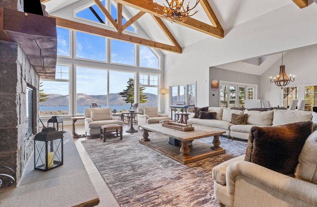 Panoramic lake view acreage with game room, sauna & fireplace