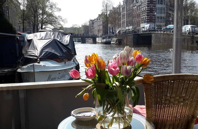 Pantheos Houseboat in Prinsengracht with a view of the Westerkerk the Landmark.