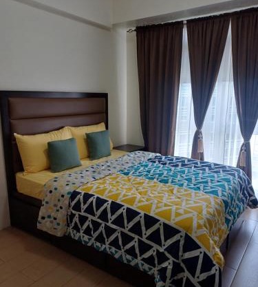Pasay 1BR Family Staycation with Parking in 150 Newport Boulevard near Resort World & NAIA T3
