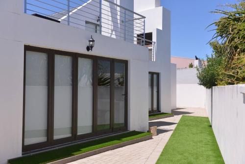 Pelican Cove is a Modern 4-Bedroom Holiday Home in Langebaan with some Sea Views