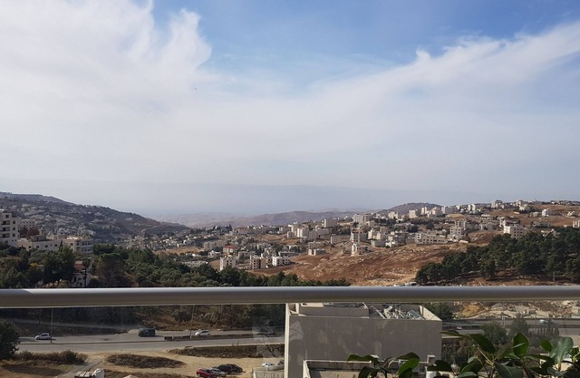 Penthouse (apartment) overlooking Jordan valley is located in Amman.