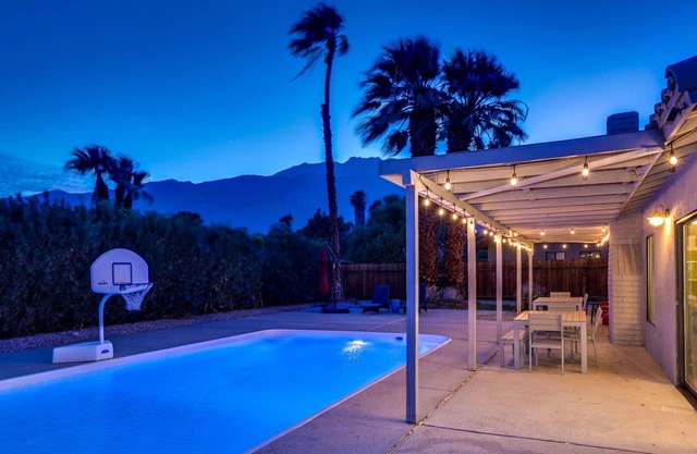 Poolside Living 4 Bedroom Home by RedAwning