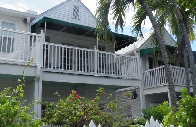 Prime location, stunning views from 2 decks—walk or ride to explore the island!