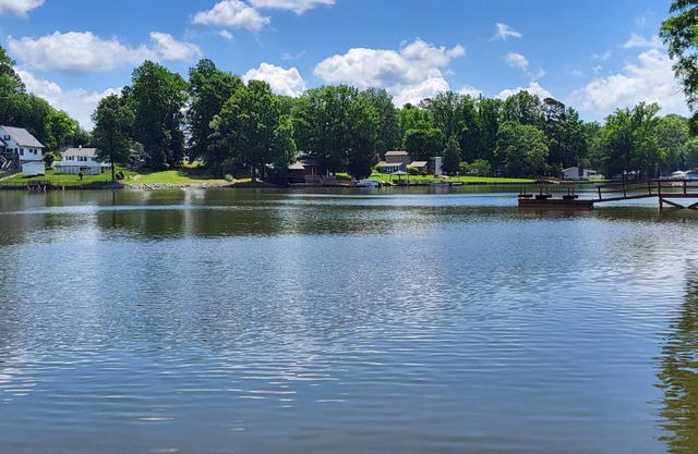 Private pier, dock, fire pit and access to boat access on High Rock lake