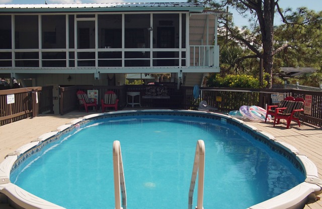 Private pool, boat dock & screened porches - 1.5 blocks to public beach access.