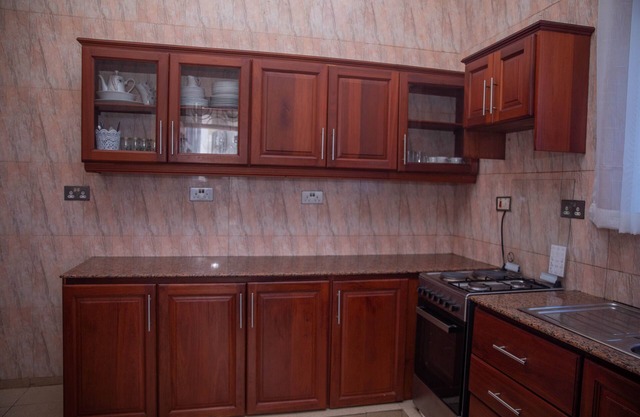 Private room in a villa - located in Sinza