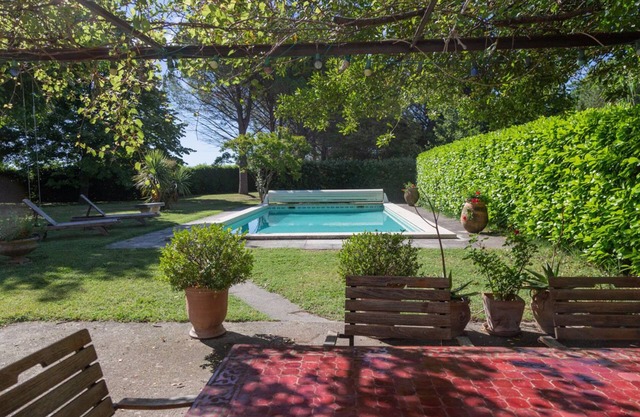 Provencal farmhouse in the countryside. Wooded and enclosed park with swimming pool, not overlooked.