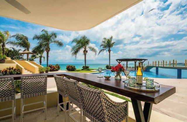 PVSR 104 · Poolside Terrace Great Beachfront Gem!