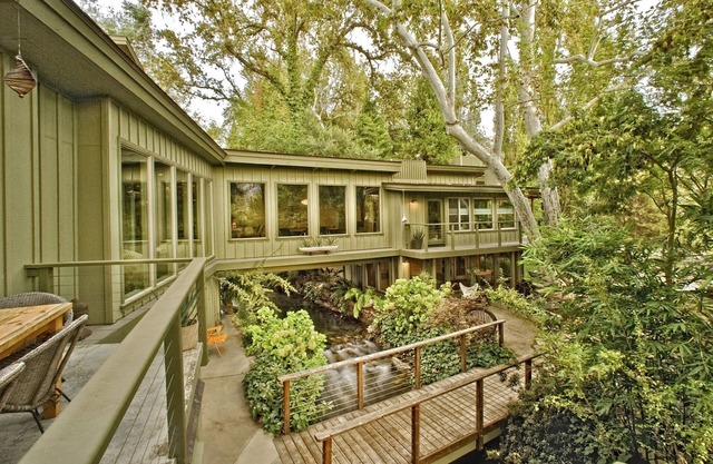Ready to escape the city? Waterfall retreat home w/river running through it!