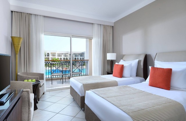 Relaxing Sun, Spa & Waterslide Escape w/Private Beach, Pools & Wellness Options
