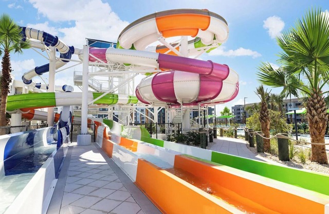 Resort-Access Getaway with Giant Pool, Slides, Themed Rooms & More