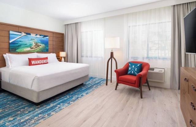 Romantic Couple Stay | Near Pristine Beaches | Outdoor Pool & Free Parking