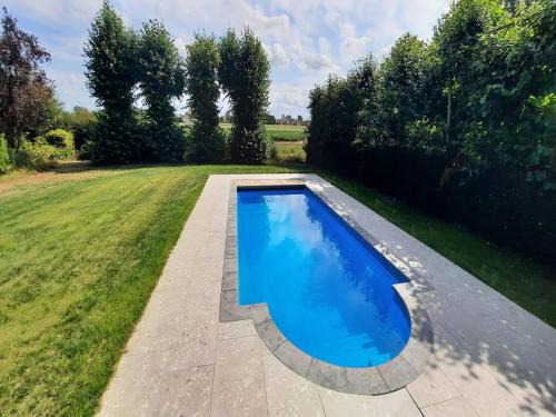 Rural holiday home with outdoor pool & sauna