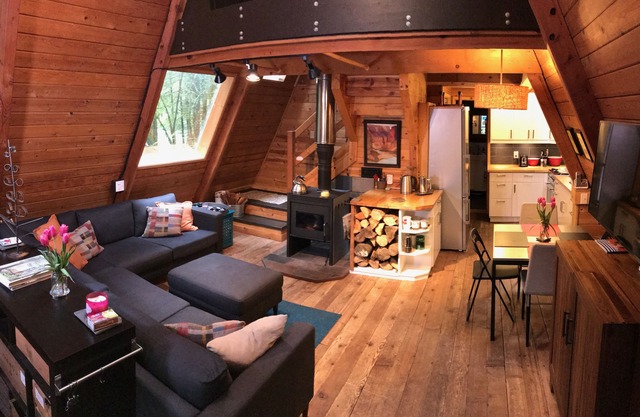 Rustic 70's A-Frame with a cozy modern interior.