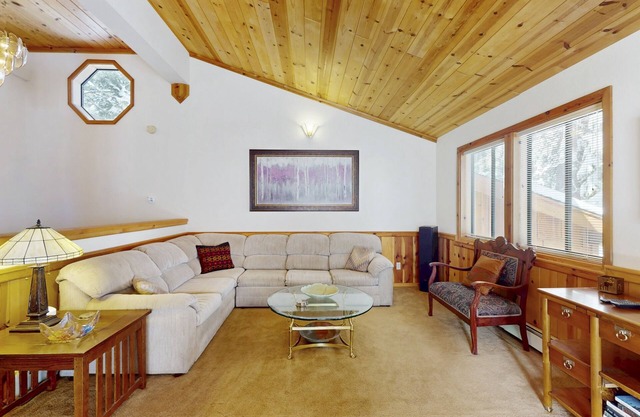 Rustic home with wood stove, deck, open floor plan, & nearby activities